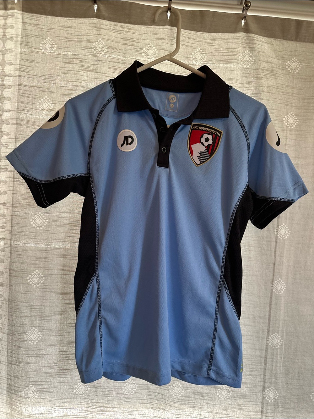 Kids Light Blue Polo Top with Black Trim - AFC Crest